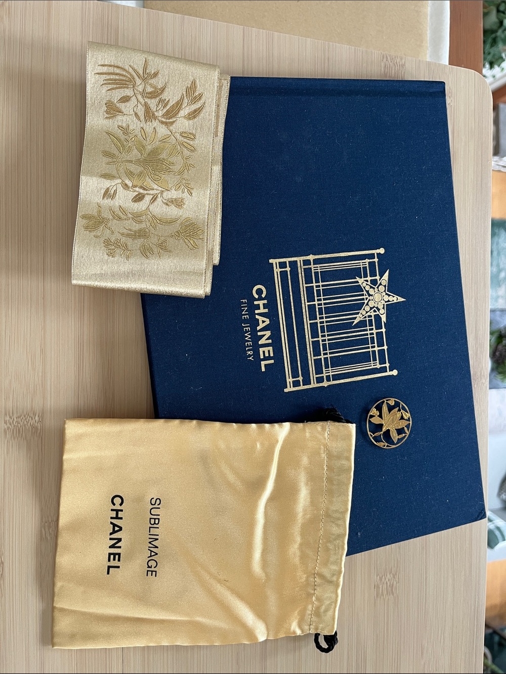 CHANEL Navy and Gold Fine Jewelry book, sublimage pouch, magnet, ribbon